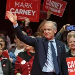 Carney’s Liberals Win, But Miss Majority Mark
