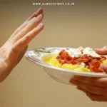 A balanced dinner plate with protein, vegetables, and healthy fats for optimal metabolism.