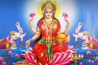 A traditional diya (oil lamp) lit near a Lakshmi idol in a clean, decorated home, symbolizing divine blessings and prosperity