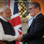 PM Modi and UK officials shake hands after signing the historic India-UK Free Trade Agreement (FTA).