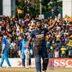 A Sri Lankan batsman Dinusha celebrates his century against India in a Test match during the final day.