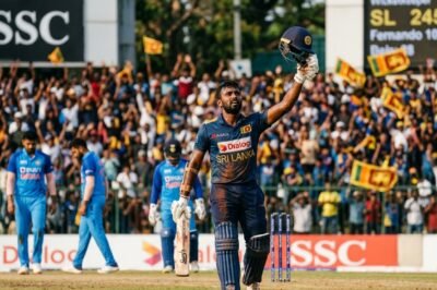 A Sri Lankan batsman Dinusha celebrates his century against India in a Test match during the final day.