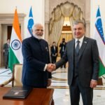 Indian Prime Minister Narendra Modi and Uzbekistan President Shavkat Mirziyoyev during a formal diplomatic meeting to sign the Comprehensive Strategic Partnership agreement.