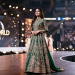 Nikita Porwal in her official Miss World 2026 contestant attire on the international stage.