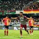 Intense action shot of the 2026 Kolkata Derby between East Bengal and Mohun Bagan at Salt Lake Stadium.