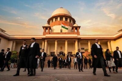 A wide-angle, authoritative photograph of the Supreme Court of India building, symbolizing the site of high-level judicial deliberation on administrative law.