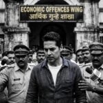 Police officers escorting actor Dino Morea outside the Economic Offences Wing office in Mumbai during a rainy afternoon.