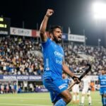 Indian hockey captain Harmanpreet Singh celebrating a goal in the 2026 Asian Games final against Malaysia.