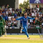 Afghanistan fast bowlers celebrating a crucial wicket against Bangladesh during an intense limited-overs match.