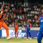 T. Natarajan in Sunrisers Hyderabad orange and Zeeshan Ansari in Delhi Capitals blue during an IPL match.