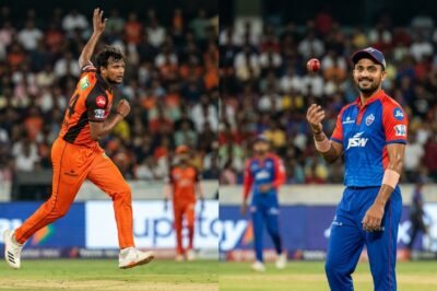 T. Natarajan in Sunrisers Hyderabad orange and Zeeshan Ansari in Delhi Capitals blue during an IPL match.